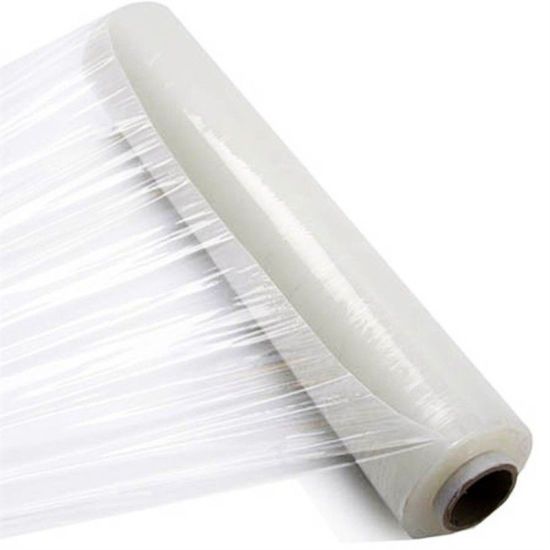 A roll of clear plastic wrap on a white background.